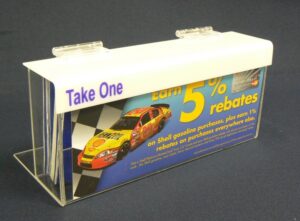 an acrylic display with automotive coupons